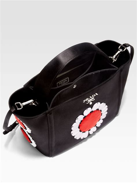 prada bag flower black|prada weave bag.